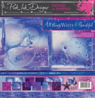 Winter-themed craft paper pack cover featuring a white unicorn with swirling blue and purple swirls and the text 'All Things White & Beautiful' with pink accents and a barcode area