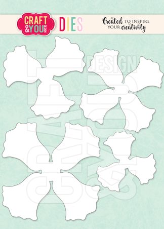 Set of white metal craft dies with irregular leaf-shaped outlines on a mint background.