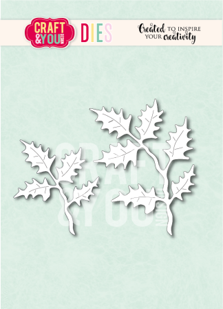 Two white holly-leaf branches die-cut shapes on a pale green craft background, framed by a Craft & You Dies banner at the top.
